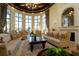 Bright and open living area with comfortable seating, elegant decor, and beautiful views at 20181 Ragazza Cir # 101, Venice, FL 34293