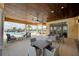 Community lounge area offers a view of the pool and ample seating for residents at 20420 Symphony Pl, Venice, FL 34293