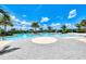 Community pool includes wading areas and fun features for children at 20420 Symphony Pl, Venice, FL 34293