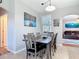 Comfortable dining area is conveniently located between the kitchen and living room, perfect for entertaining guests at 2115 Pan American Blvd, North Port, FL 34287