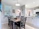 Charming dining area provides a seamless transition between the kitchen and living spaces, great for Gathering gatherings at 2115 Pan American Blvd, North Port, FL 34287