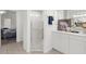 Bright bathroom featuring a glass-enclosed shower and modern vanity with ample storage at 213 Venice Palms Blvd, Venice, FL 34292