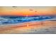 Beautiful sunset over the ocean waves on a sandy beach at 213 Venice Palms Blvd, Venice, FL 34292