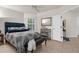 Bedroom features stylish furnishings, natural light, and a calming color scheme, creating a relaxing retreat at 213 Venice Palms Blvd, Venice, FL 34292