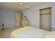 This bedroom features carpet and a large closet at 2221 Bal Harbour Dr, Venice, FL 34293