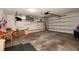 Spacious garage offers ample storage and parking, with potential for workshop or hobby area at 2221 Bal Harbour Dr, Venice, FL 34293
