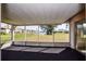 This patio looks out to a pond and green space at 2221 Bal Harbour Dr, Venice, FL 34293