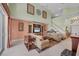 Open-concept living area with built-ins, tile flooring, and natural light at 23138 Copperleaf Dr, Venice, FL 34293