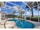 Beautiful screened-in pool and spa with a lovely lake view at 23138 Copperleaf Dr, Venice, FL 34293