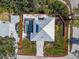 Aerial view of the property's backyard with an in-ground pool at 2371 Scenic Dr, Venice, FL 34293