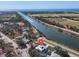 Aerial view of home with a private river access at 2371 Scenic Dr, Venice, FL 34293