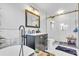 Beautiful bathroom featuring a freestanding tub, a glass-enclosed shower, and stylish decor at 2371 Scenic Dr, Venice, FL 34293