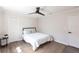 Bedroom featuring hardwood floors, a ceiling fan, and a comfortable bed at 255 San Cristobal Ave, Punta Gorda, FL 33983