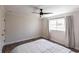 Bedroom featuring hardwood floors, window with curtains, and neutral paint at 255 San Cristobal Ave, Punta Gorda, FL 33983