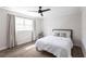 Bedroom featuring a ceiling fan, natural light, and a comfortable bed at 255 San Cristobal Ave, Punta Gorda, FL 33983