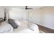 Bright bedroom featuring hardwood floors, a modern ceiling fan, and neutral decor at 255 San Cristobal Ave, Punta Gorda, FL 33983