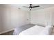 Comfortable bedroom offers a ceiling fan, a closet, and ample space in a neutral color palette at 255 San Cristobal Ave, Punta Gorda, FL 33983