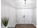 Elegant entryway featuring a chandelier and double doors at 255 San Cristobal Ave, Punta Gorda, FL 33983