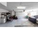 Spacious two car garage with overhead door, storage shelves, and room for vehicles and projects at 255 San Cristobal Ave, Punta Gorda, FL 33983