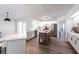 Bright kitchen with stainless steel appliances, a wooden island, and modern white cabinetry and backsplash at 255 San Cristobal Ave, Punta Gorda, FL 33983