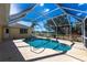 Private screened pool area with scenic lake views, a perfect setting for outdoor relaxation and entertaining at 255 San Cristobal Ave, Punta Gorda, FL 33983