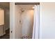 Walk-in shower featuring tile surround, chrome fixtures, and pebbled floor at 255 San Cristobal Ave, Punta Gorda, FL 33983