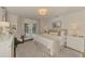 Bedroom featuring french doors to the outdoor pool area at 2799 Algardi Ln, North Port, FL 34286