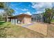 Backyard view of screened in pool with fenced area at 2799 Algardi Ln, North Port, FL 34286