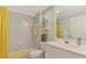 Bathroom featuring a bath tub with shower and a large vanity sink at 310 Lynbrook Cir # 103, Venice, FL 34292