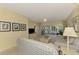 Cozy living room with comfortable seating and sliding glass doors to a screened lanai at 310 Lynbrook Cir # 103, Venice, FL 34292