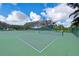 Well-maintained community tennis courts offer an active and engaging recreational amenity at 310 Lynbrook Cir # 103, Venice, FL 34292