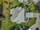 Aerial shot of a well-manicured home featuring a new roof and a lovely landscaped yard at 316 Wexford Ter # 167, Venice, FL 34293