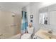 A practical full bathroom design with a shower-tub combination, toilet, and vanity at 3300 Loveland Blvd # 1201, Punta Gorda, FL 33980