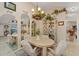 Cozy dining area with decorative mirrors, chandelier, and seamless integration with the living space at 3300 Loveland Blvd # 1201, Punta Gorda, FL 33980