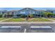 Charming condo exterior with landscaped front yard and assigned parking spaces for easy access at 3300 Loveland Blvd # 1201, Punta Gorda, FL 33980