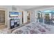 Light filled main bedroom with outdoor access to patio area at 3300 Loveland Blvd # 1201, Punta Gorda, FL 33980