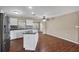Bright kitchen with stainless steel appliances, a kitchen island, and tile backsplash at 3716 Dunbar Rd, Venice, FL 34293