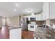 Bright eat-in kitchen area with stainless steel appliances and tile backsplash at 3716 Dunbar Rd, Venice, FL 34293