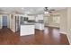 Eat-in kitchen with stainless steel appliances, stone countertops, and white cabinets at 3716 Dunbar Rd, Venice, FL 34293