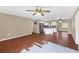 Bright living room and kitchen with updated cabinets and stainless steel appliances at 3716 Dunbar Rd, Venice, FL 34293
