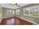 Living room featuring hardwood floors, natural light from the exterior, and modern design elements at 3716 Dunbar Rd, Venice, FL 34293