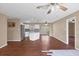 Open-concept living space with recessed lighting and ceiling fans in the living room and kitchen area at 3716 Dunbar Rd, Venice, FL 34293
