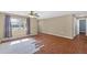 Bright living room with beautiful hardwood floors and natural light coming through the window at 3716 Dunbar Rd, Venice, FL 34293