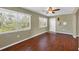 Living room featuring hardwood floors, natural light from the exterior, and modern design elements at 3716 Dunbar Rd, Venice, FL 34293