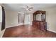 Spacious main bedroom featuring hardwood floors, and a dressing mirror at 3716 Dunbar Rd, Venice, FL 34293