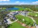 Stunning golf course with lush fairways, serene lakes, and an elegant clubhouse overlooking the green at 385 N Point Rd # 404, Osprey, FL 34229
