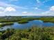 Scenic water view from the property overlooking islands and vibrant greenery in clear daylight at 385 N Point Rd # 404, Osprey, FL 34229