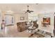 Cozy living room featuring neutral tones, comfortable seating, and an inviting open-concept layout at 446 Pinewood Lake Dr, Venice, FL 34285