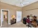 Office space featuring a desk, chair, closet and printer at 446 Pinewood Lake Dr, Venice, FL 34285