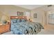 Serene main bedroom featuring a spacious layout and an ensuite bathroom at 454 Cerromar Rd # 172, Venice, FL 34293